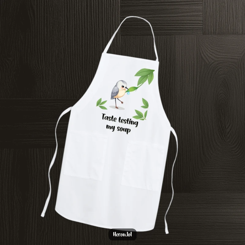 Funny Heron Apron: A heron focused on a dewdrop, designed for kitchen elegance and a touch of natural humor.