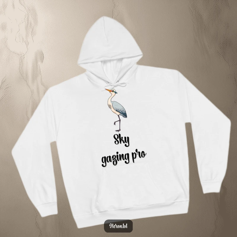 Cute heron bird standing on one leg, looking skyward, captured on a soft and warm hoodie.