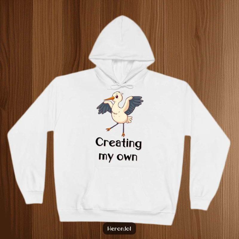 Funny Hoodie showing a chubby heron with wings gently flapping, creating a soft, cooling breeze, ideal for relaxation.