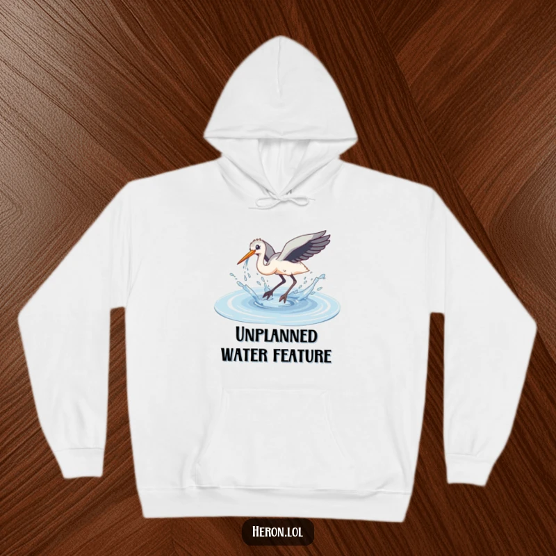 Funny Clumsy Dive Heron Hoodie: A heron makes a messy, clumsy dive into a puddle, splashing water everywhere.