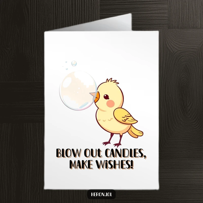Funny free printable birthday card featuring a cute bird blowing a giant, iridescent bubble from its beak with glee.