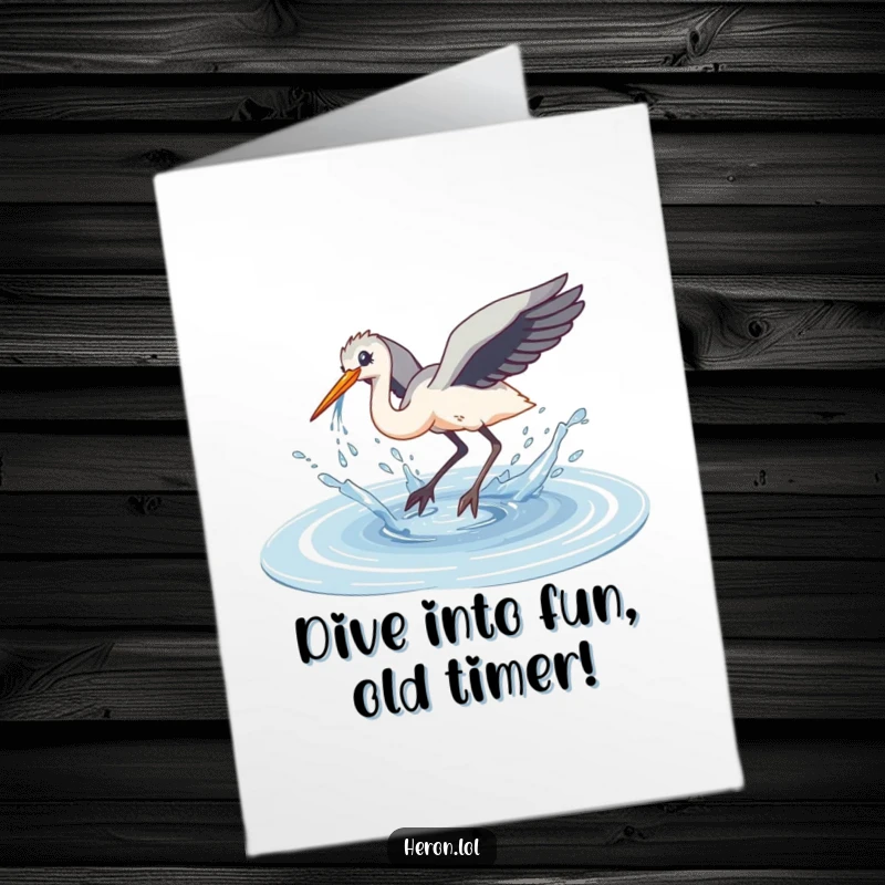 Funny Free Printable Heron Birthday Card: Heron mid-clumsy dive into a puddle, sending water splashing everywhere.