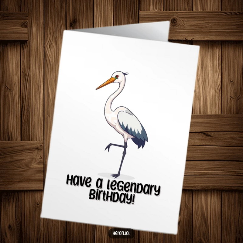 Funny Free Printable Birthday Card: Cute heron with a long neck elegantly curved, posing gracefully on one leg.