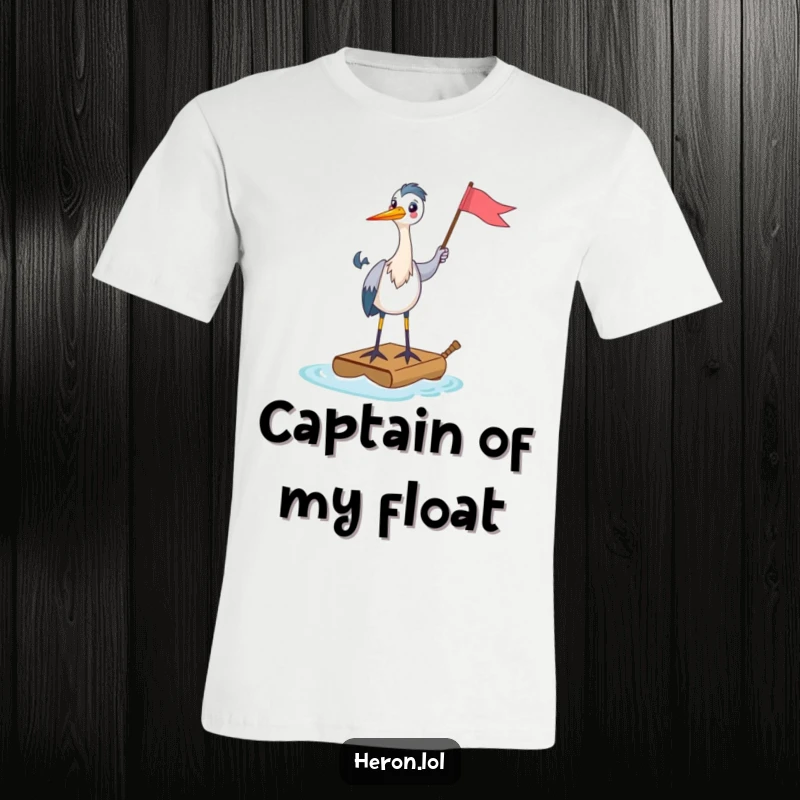 Funny T-Shirt showcasing a happy heron standing on a tiny raft, holding a flag, symbolizing cheerful exploration and humorous self-reliance.