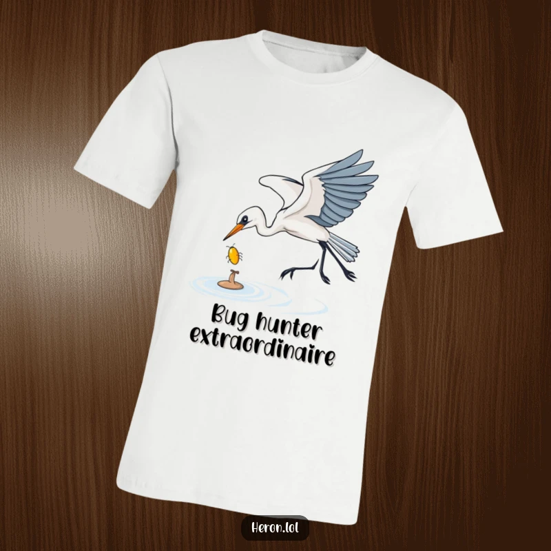 Funny T-Shirt depicting a heron gracefully swooping down to catch a shiny bug, illustrating focused hunting with a humorous, dynamic action.