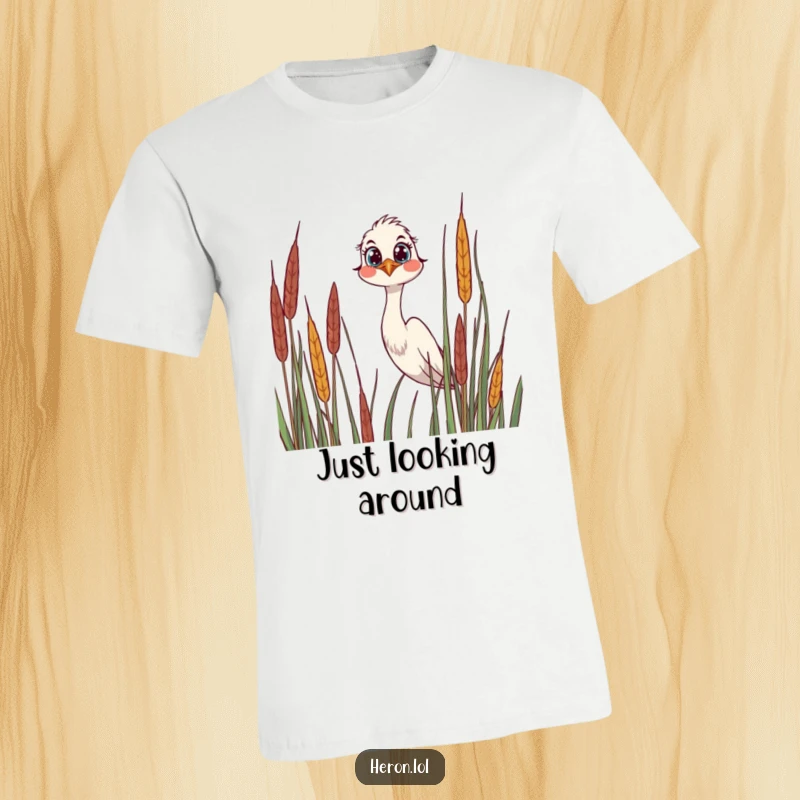 Funny T-Shirt featuring a joyful heron peering over reeds, its big curious eyes full of wonder and playful mischief.
