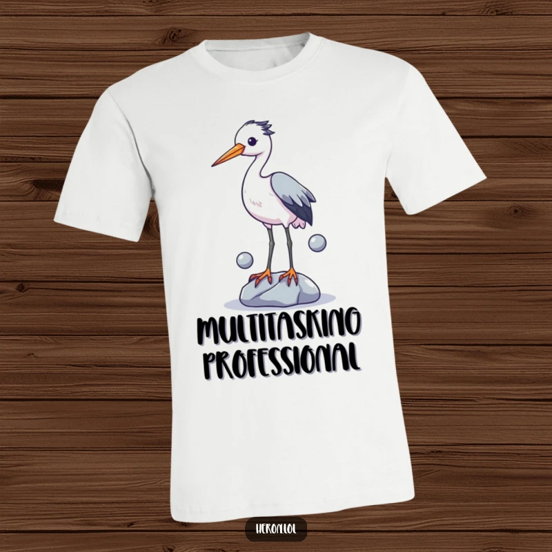 Funny t-shirt with a heron artistically failing to juggle three small stones using its legs, expressing intense concentration and slight panic.