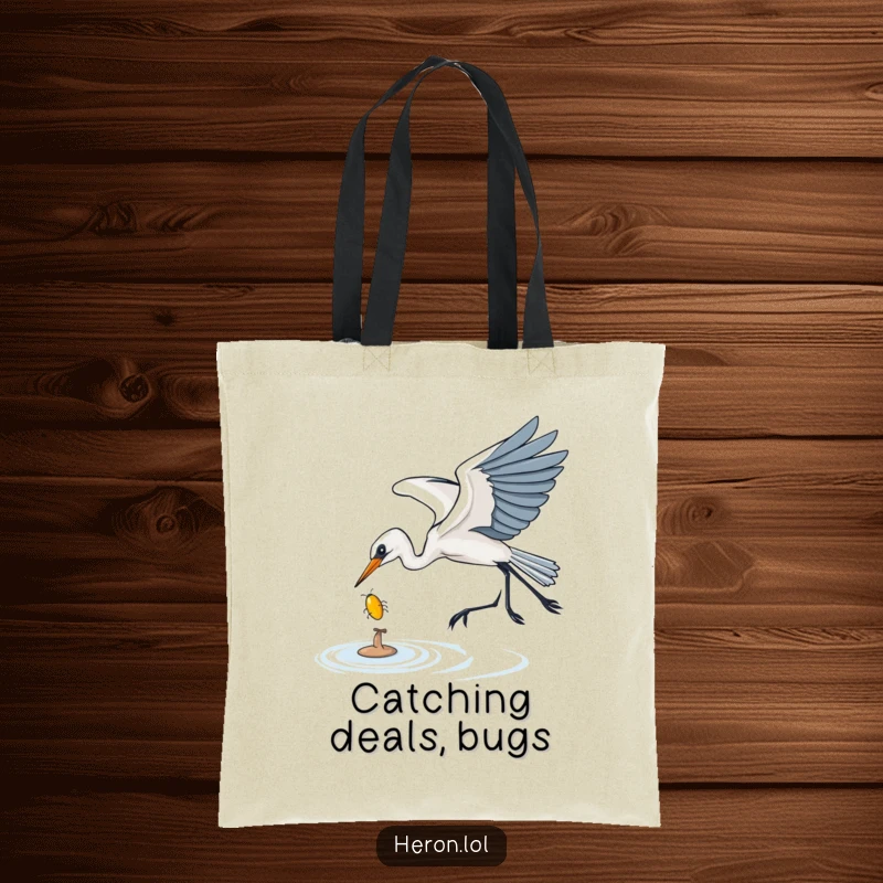 Funny Tote Bag illustrating a heron gracefully swooping down to catch a shiny bug, perfect for carrying items with a humorous, nature-inspired theme.