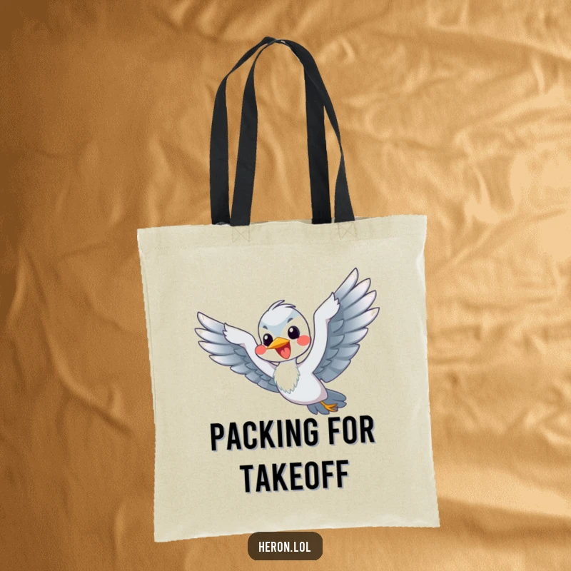 Funny Flying Heron Tote Bag: A happy heron flaps its flippers energetically, humorously attempting to fly.