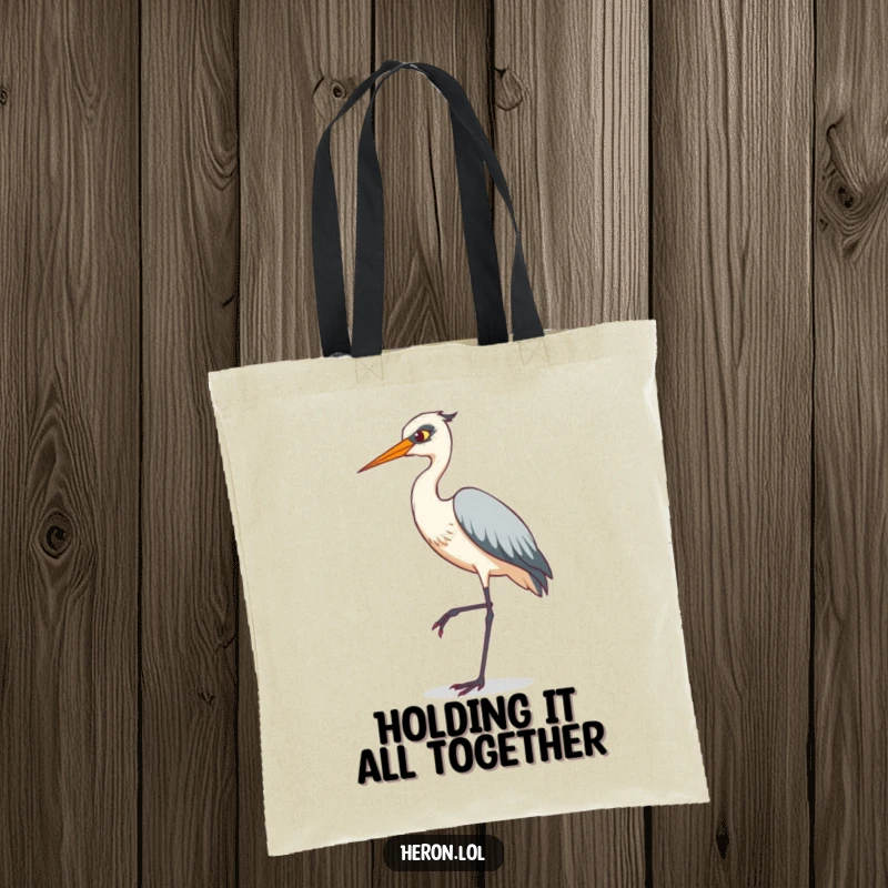 Funny tote bag illustrating a heron in a comical tiptoeing stance on one leg, a humorous accessory for everyday use.